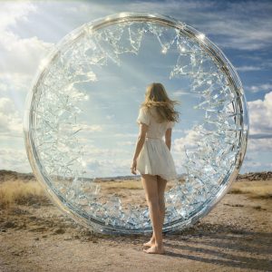 Surreal artwork of a woman standing before a shattered glass portal in an open landscape, symbolizing breaking old habits, mental transformation, and stepping into a better life.