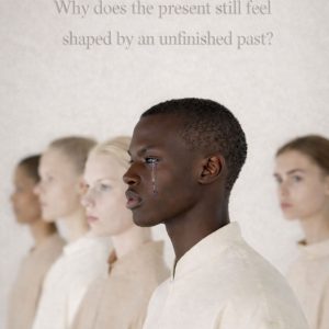 Surreal mixed-media portrait artwork by Lisa Bayer featuring a group of figures in soft neutral garments, with a dark-skinned man in the foreground shedding a blue tear beneath the words, “Why does the present still feel shaped by an unfinished past?”